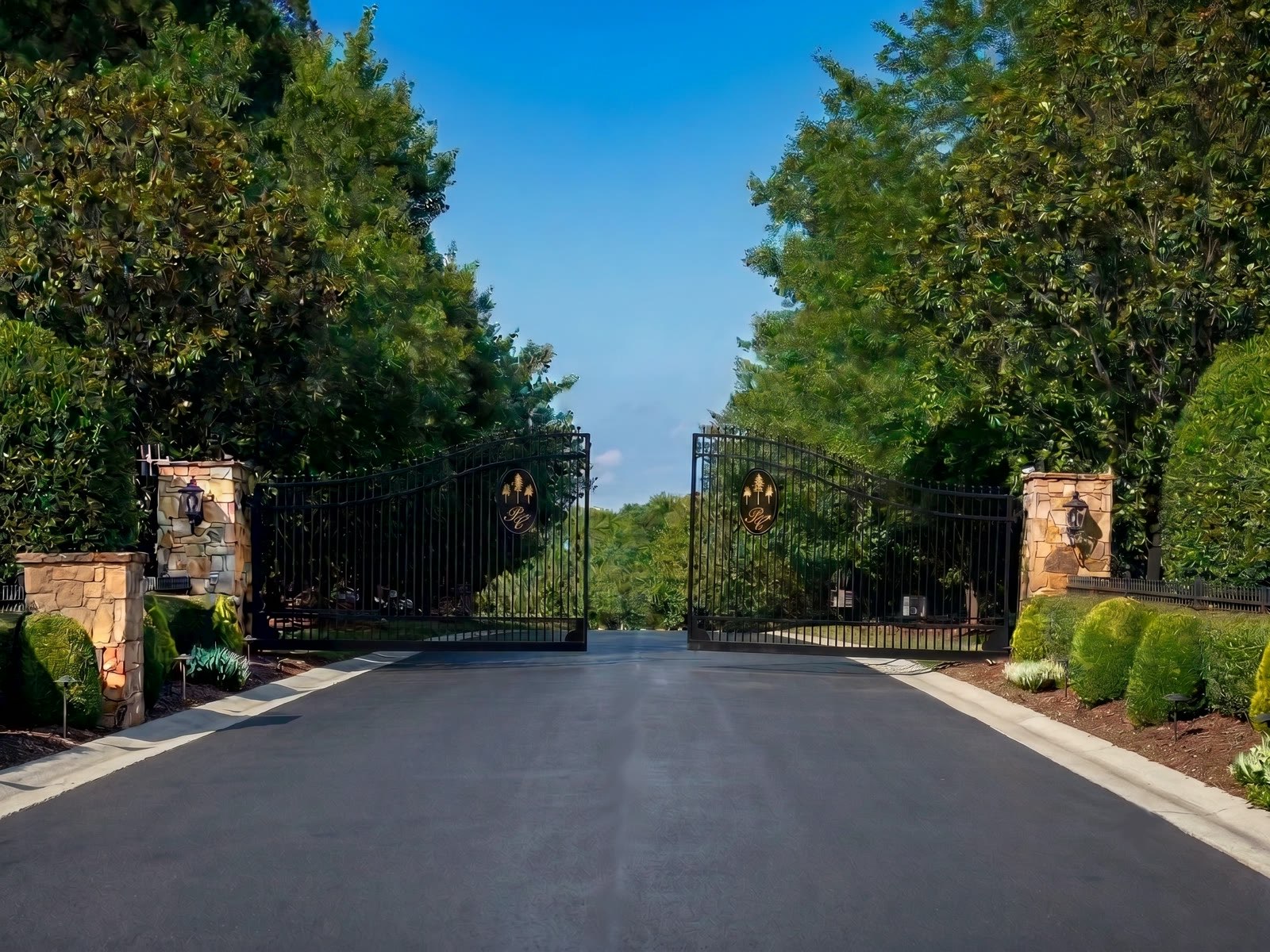 The gated stone entrance to Pine Creek