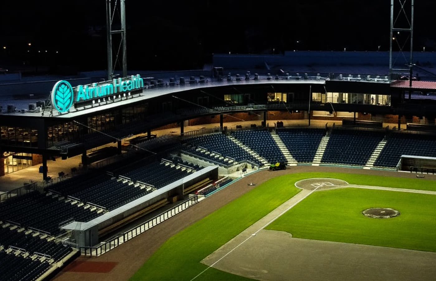 Atrium Health Ballpark, home of the Kannapolis Cannon Ballers, lit up at night